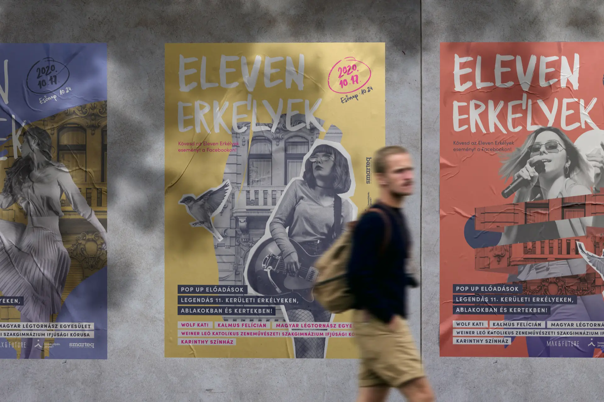 Az Eleven Erkélyek program plakátjai egy utcai falon, előttük járókelő